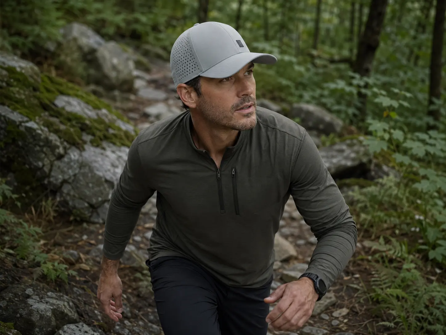 Outdoor performance cap with laser-perforated panels